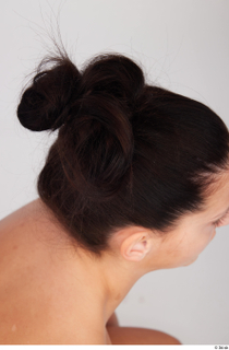 Suleika black hair messy bun 0007.jpg